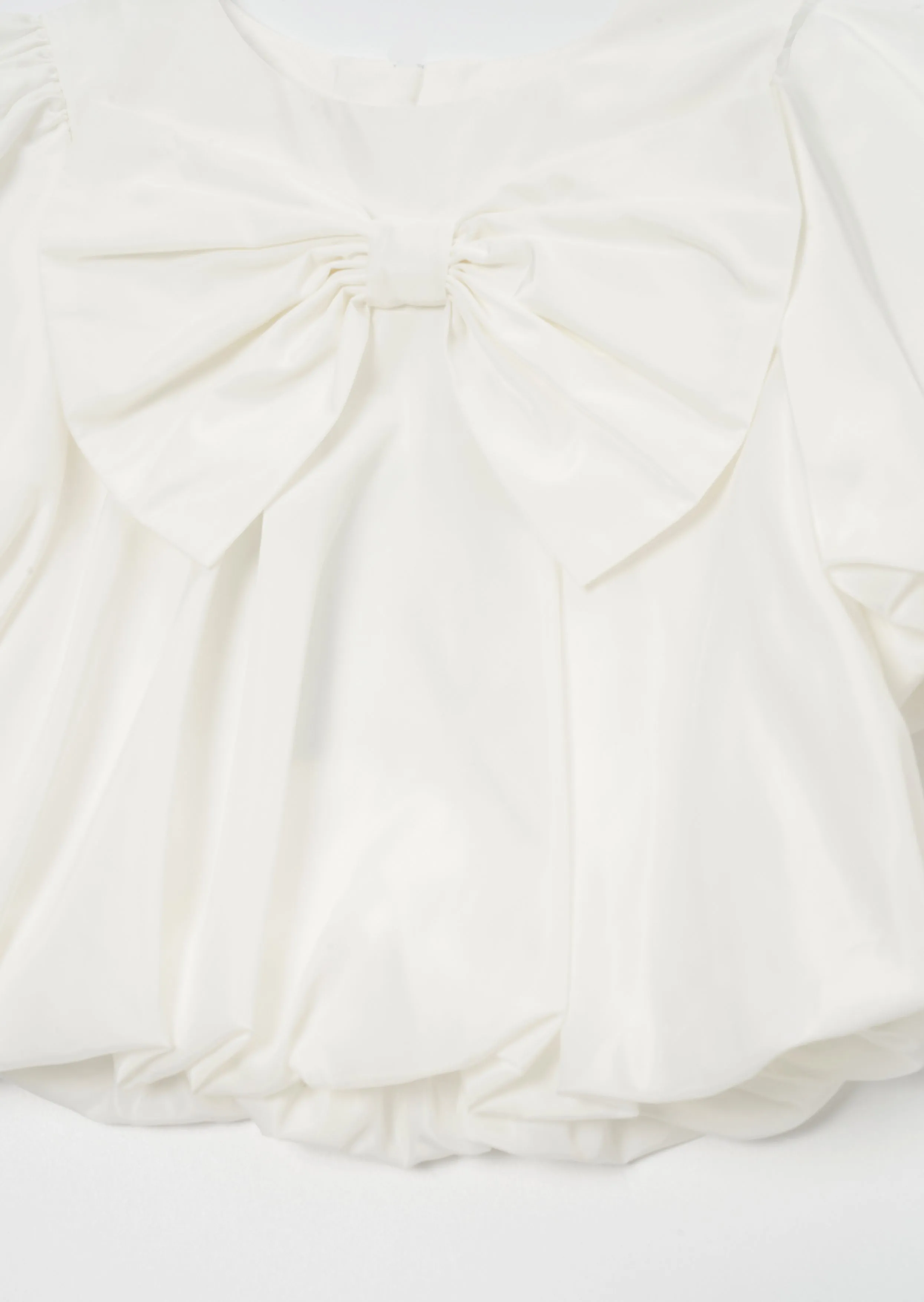 Nadia Ivory Bubble Hem Bow Top